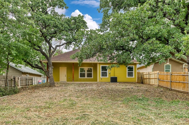 2621 Canton Dr, Fort Worth, TX 76112 - rear view of house featuring a fenced backyard and roof with shingles