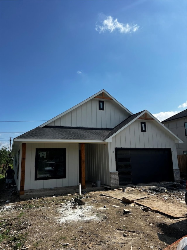 1117 Fort Worth, Grand Prairie, TX 75050 - view of front of home featuring roof with shingles and an attached garage
