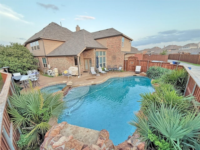 14249 Fall Harvest Dr, Frisco, TX 75033 - view of pool featuring a fenced backyard, a patio area, and a pool with connected hot tub