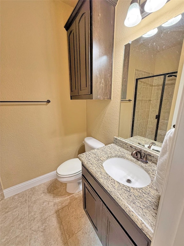 14249 Fall Harvest Dr, Frisco, TX 75033 - full bath with vanity, tiled shower, a textured wall, and tile patterned flooring