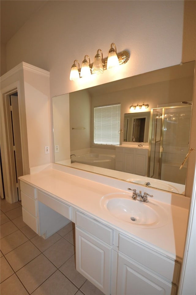 1120 Surrey Ln, Allen, TX 75013 - bathroom featuring tile patterned floors, vanity, a stall shower, and a garden tub