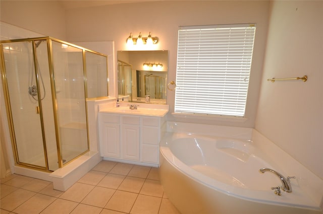 1120 Surrey Ln, Allen, TX 75013 - full bathroom featuring a garden tub, vanity, a shower stall, and tile patterned flooring