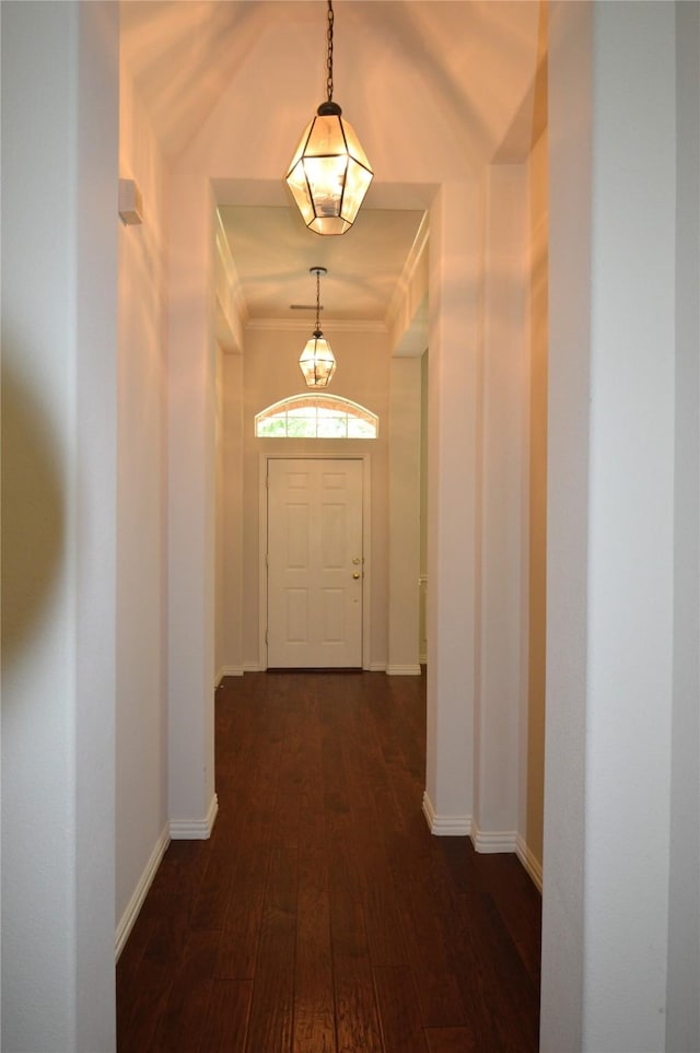 1120 Surrey Ln, Allen, TX 75013 - hallway featuring dark wood-type flooring, a chandelier, and crown molding