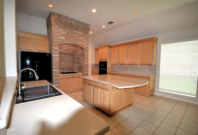 1120 Surrey Ln, Allen, TX 75013 - kitchen with black appliances, light brown cabinetry, tasteful backsplash, light tile patterned floors, and lofted ceiling