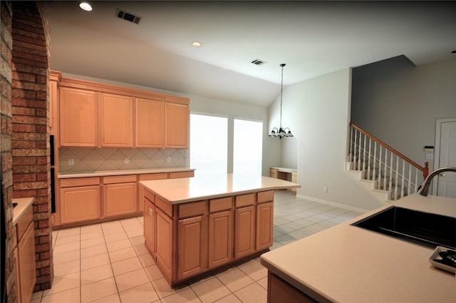 1120 Surrey Ln, Allen, TX 75013 - kitchen with light countertops, light tile patterned flooring, decorative light fixtures, lofted ceiling, and a chandelier