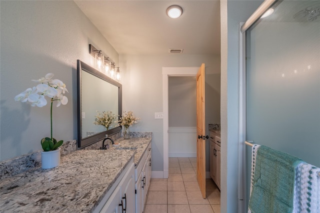 18 Tula Ct, Nocona, TX 76255 - full bathroom featuring vanity and tile patterned floors