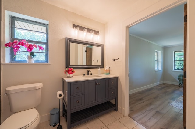 18 Tula Ct, Nocona, TX 76255 - bathroom with vanity, ornamental molding, and wood finished floors