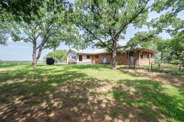 18 Tula Ct, Nocona, TX 76255 - back of house with brick siding