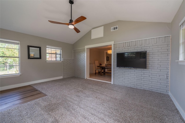 18 Tula Ct, Nocona, TX 76255 - unfurnished living room with ceiling fan, carpet floors, and lofted ceiling