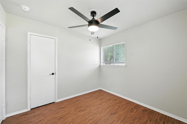 324 Jasmine Ct, Burleson, TX 76028 - empty room featuring a smoke detector, wood finished floors, and ceiling fan