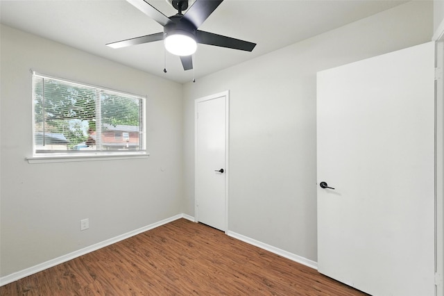 324 Jasmine Ct, Burleson, TX 76028 - unfurnished bedroom featuring wood finished floors and a ceiling fan