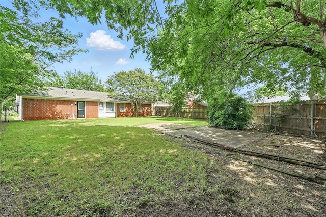 324 Jasmine Ct, Burleson, TX 76028 - fenced backyard with a patio area