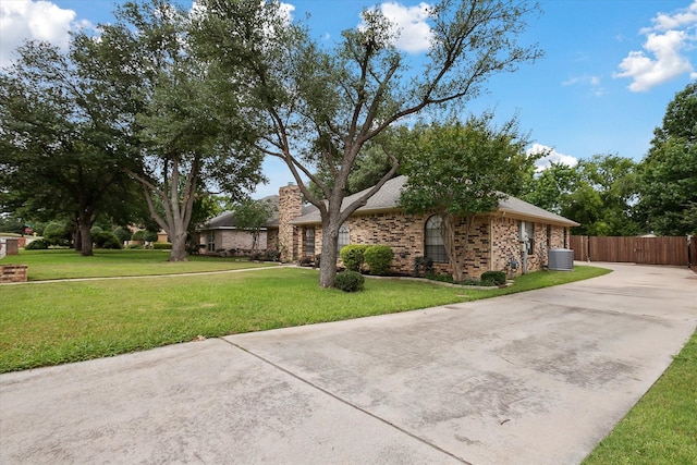 1112 Indian Ridge Dr, Denton, TX 76205 - view of front facade featuring brick siding and a chimney