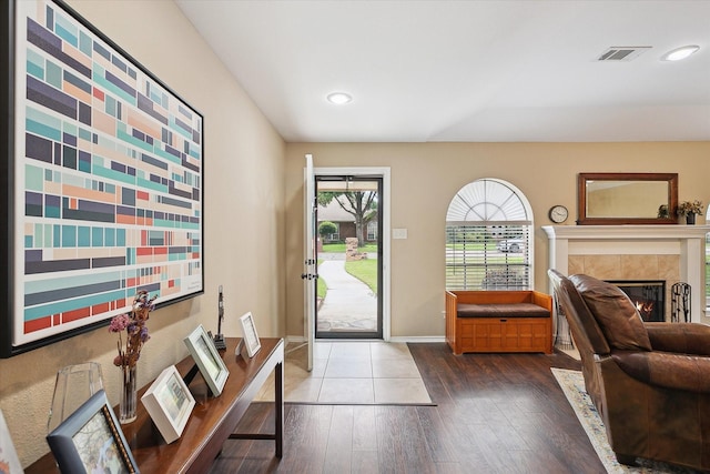 1112 Indian Ridge Dr, Denton, TX 76205 - foyer entrance featuring hardwood / wood-style floors, a fireplace, and recessed lighting