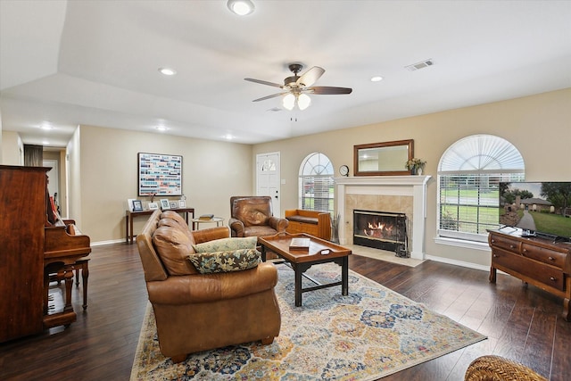 1112 Indian Ridge Dr, Denton, TX 76205 - living area featuring dark wood finished floors, a ceiling fan, a tile fireplace, and recessed lighting