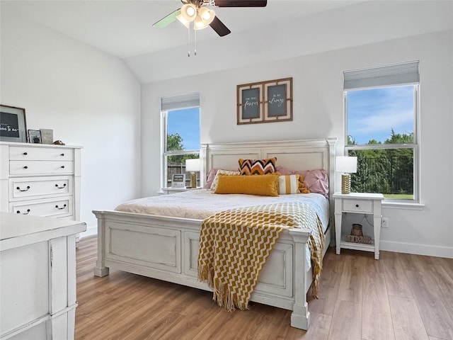 3978 Sidney Ln, Heath, TX 75126 - bedroom featuring light wood finished floors, lofted ceiling, and a ceiling fan