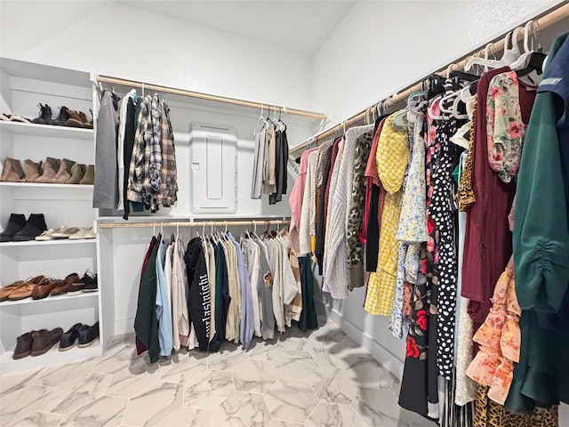 3978 Sidney Ln, Heath, TX 75126 - walk in closet featuring marble look tile flooring