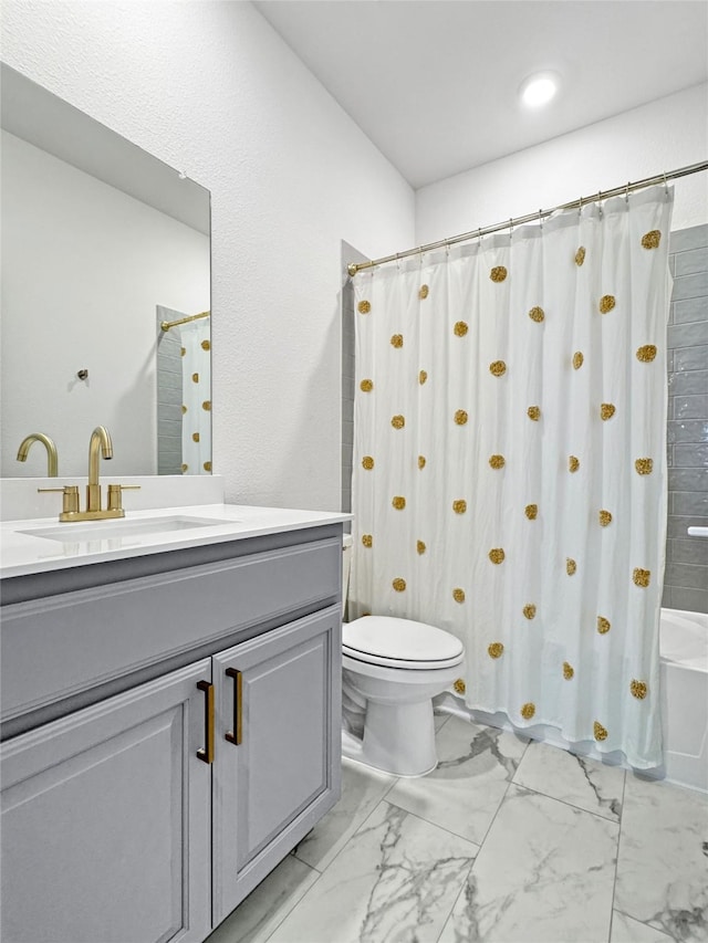 3978 Sidney Ln, Heath, TX 75126 - bathroom featuring marble look tile flooring, vanity, and shower / bath combo
