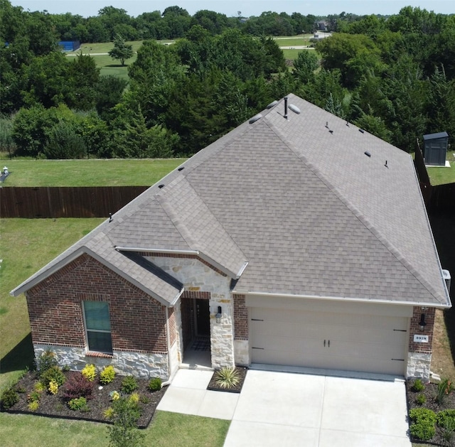 3978 Sidney Ln, Heath, TX 75126 - view of front of home with brick siding, a shingled roof, and an attached garage