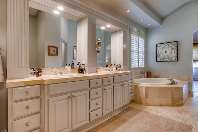 4139 Herschel Ave, Dallas, TX 75219 - bathroom with crown molding, double vanity, a garden tub, tile patterned flooring, and recessed lighting