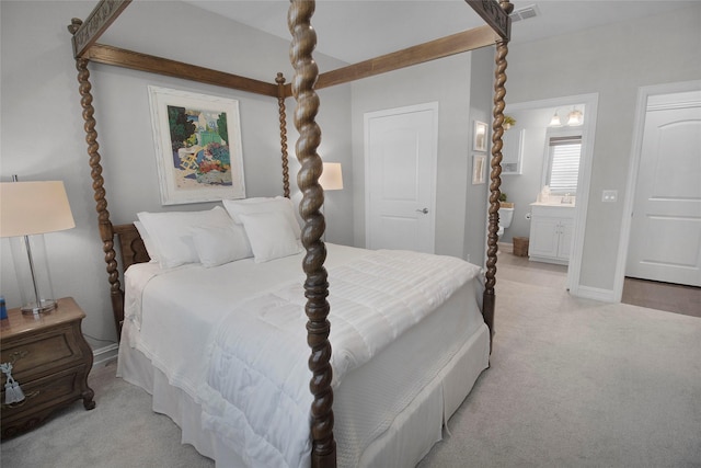 717 Freedom Ln, Aubrey, TX 76227 - bedroom featuring light carpet and connected bathroom