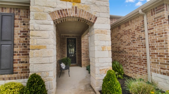717 Freedom Ln, Aubrey, TX 76227 - property entrance with brick siding