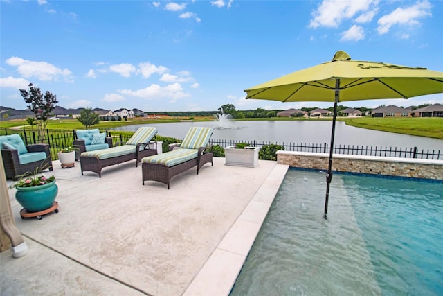 717 Freedom Ln, Aubrey, TX 76227 - view of swimming pool with a water view, a patio area, an outdoor living space, and a pool