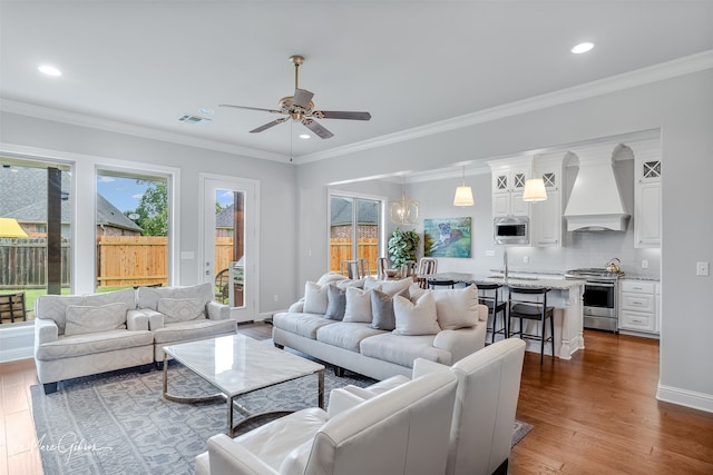 1101 Cypress Creek Cir, Shreveport, LA 71106 - living room with a ceiling fan, recessed lighting, dark wood-style floors, and crown molding