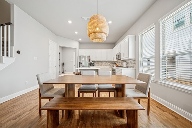 420 Waterscape Dr Unit 1237, Lake Dallas, TX 75065 - dining area with light wood-type flooring and recessed lighting