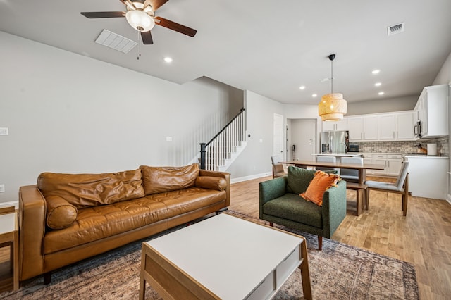 420 Waterscape Dr Unit 1237, Lake Dallas, TX 75065 - living area featuring a ceiling fan, stairway, recessed lighting, and light wood-style floors