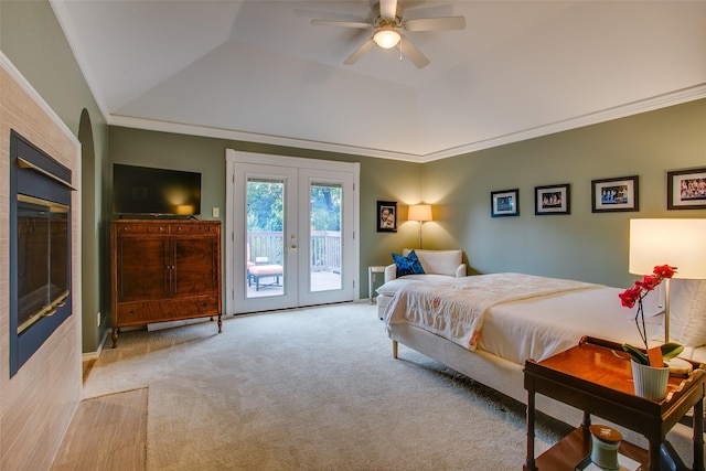 18423 Rain Dance Trl, Dallas, TX 75252 - carpeted bedroom featuring access to exterior, french doors, crown molding, a raised ceiling, and a glass covered fireplace