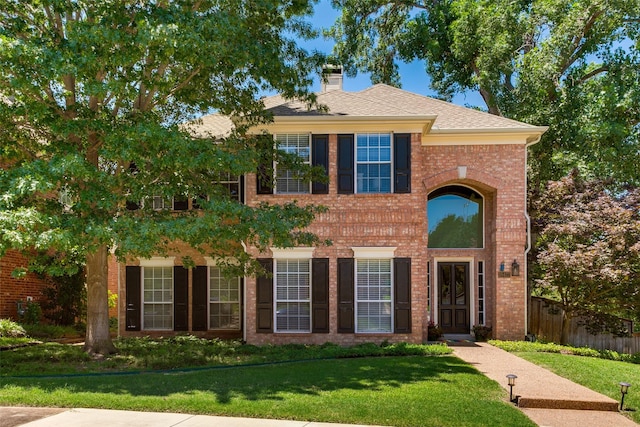 18423 Rain Dance Trl, Dallas, TX 75252 - view of front of home featuring brick siding and a chimney