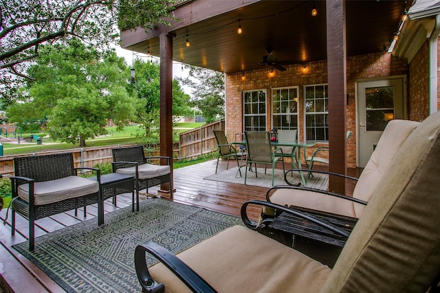 18423 Rain Dance Trl, Dallas, TX 75252 - wooden terrace with a ceiling fan and outdoor dining space