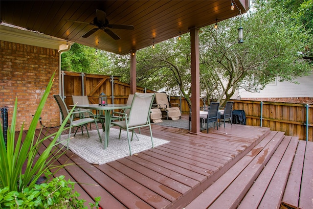 18423 Rain Dance Trl, Dallas, TX 75252 - wooden deck featuring outdoor dining space, a fenced backyard, and a ceiling fan