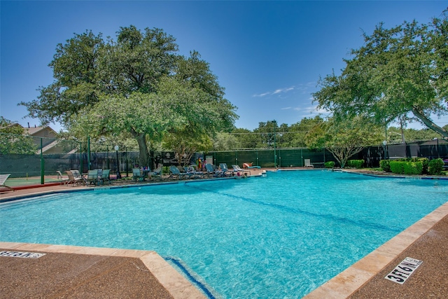 18423 Rain Dance Trl, Dallas, TX 75252 - community pool with a patio