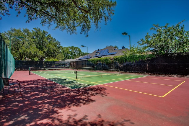 18423 Rain Dance Trl, Dallas, TX 75252 - view of tennis court with community basketball court