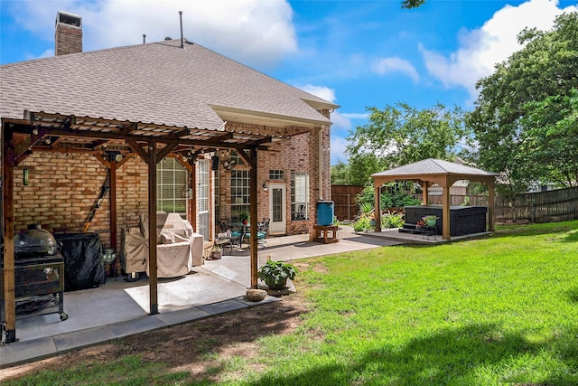 204 Oregon Trl, Argyle, TX 76226 - back of property featuring a gazebo, a fenced backyard, roof with shingles, and a chimney