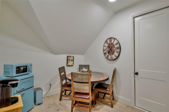 1001 Quarry Ct, Granbury, TX 76048 - dining area featuring lofted ceiling and light wood-style flooring