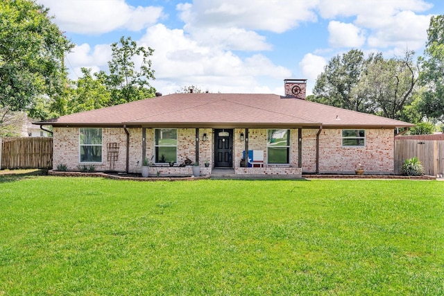 845 Griffith Ave, Terrell, TX 75160 - view of front facade featuring a chimney, brick siding, and covered porch