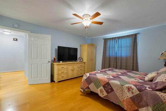 845 Griffith Ave, Terrell, TX 75160 - bedroom with light wood-style flooring and ceiling fan