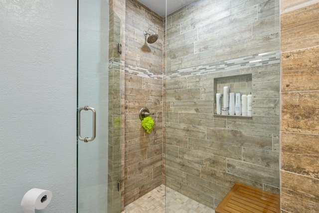 845 Griffith Ave, Terrell, TX 75160 - full bathroom with a stall shower and a textured wall