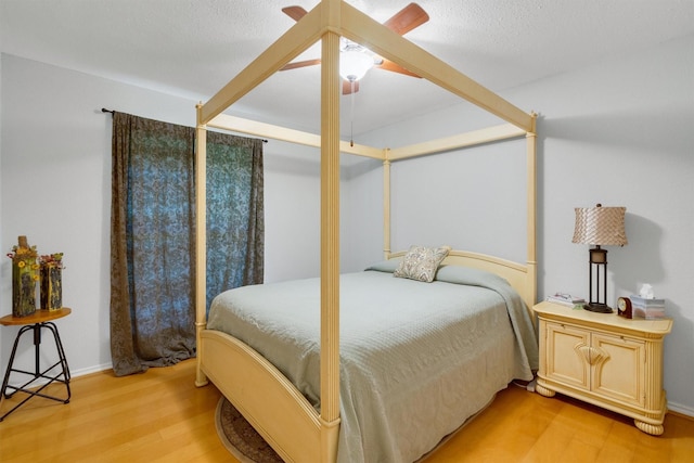 845 Griffith Ave, Terrell, TX 75160 - bedroom with light wood-style floors and a ceiling fan