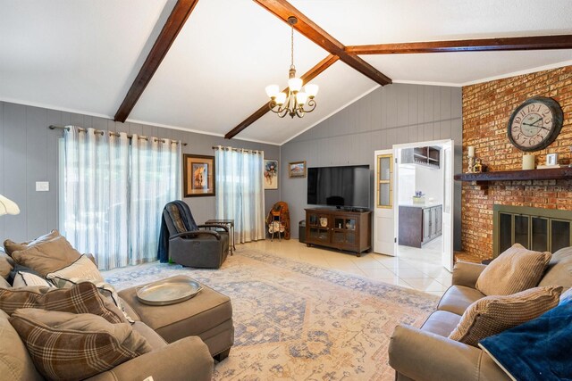 845 Griffith Ave, Terrell, TX 75160 - tiled living room with a chandelier, a fireplace, and wood walls