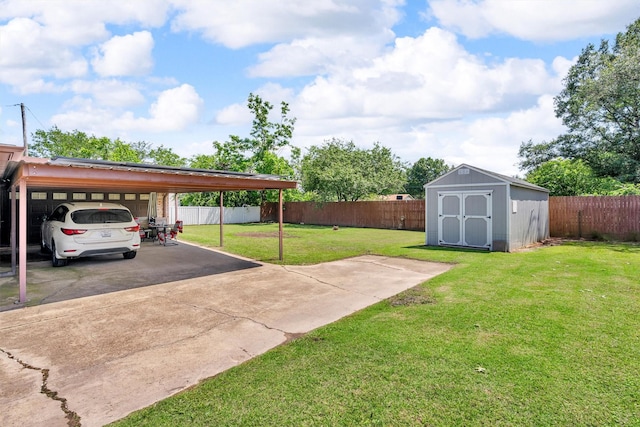 845 Griffith Ave, Terrell, TX 75160 - fenced backyard with a shed, concrete driveway, a carport, and an attached garage