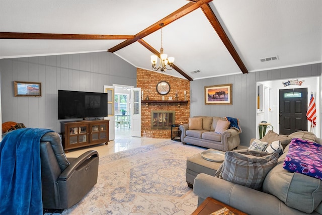 845 Griffith Ave, Terrell, TX 75160 - tiled living room featuring a chandelier and a fireplace