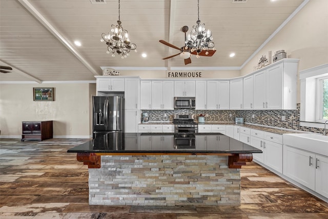 139 County Road 376, Lott, TX 76656 - kitchen with appliances with stainless steel finishes, a chandelier, dark wood finished floors, ornamental molding, and wood ceiling