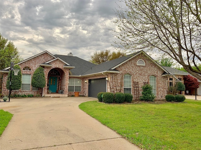 1507 Bridge Water Ln, Mansfield, TX 76063 - traditional home with brick siding, a garage, a front yard, and driveway