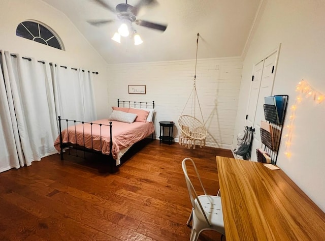 1507 Bridge Water Ln, Mansfield, TX 76063 - bedroom featuring wood finished floors, lofted ceiling, brick wall, and a ceiling fan