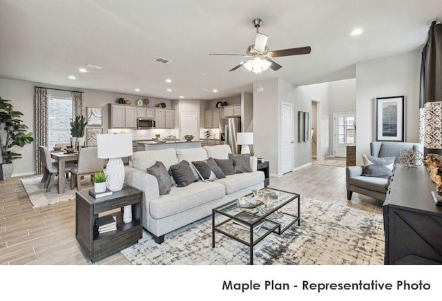 1806 Iris, Melissa, TX 75454 - living area featuring healthy amount of natural light, ceiling fan, light wood finished floors, and recessed lighting
