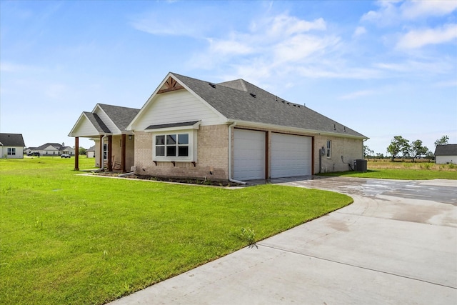 5150 Fox Trot Ln, Caddo Mills, TX 75135 - view of front facade with brick siding, concrete driveway, a front yard, and roof with shingles